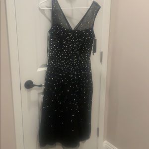 Beautiful designer black dress with pearls!
